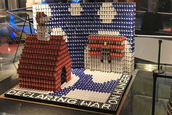 Snoopy dog house and Red baron constructed out of cans