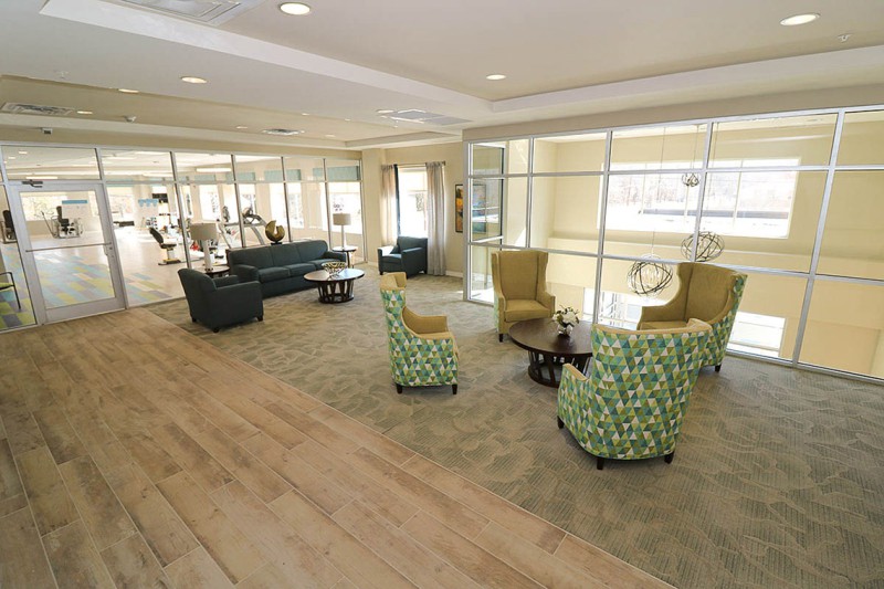 Eastbrook Nursing Home sitting area with comfortable chairs and couches