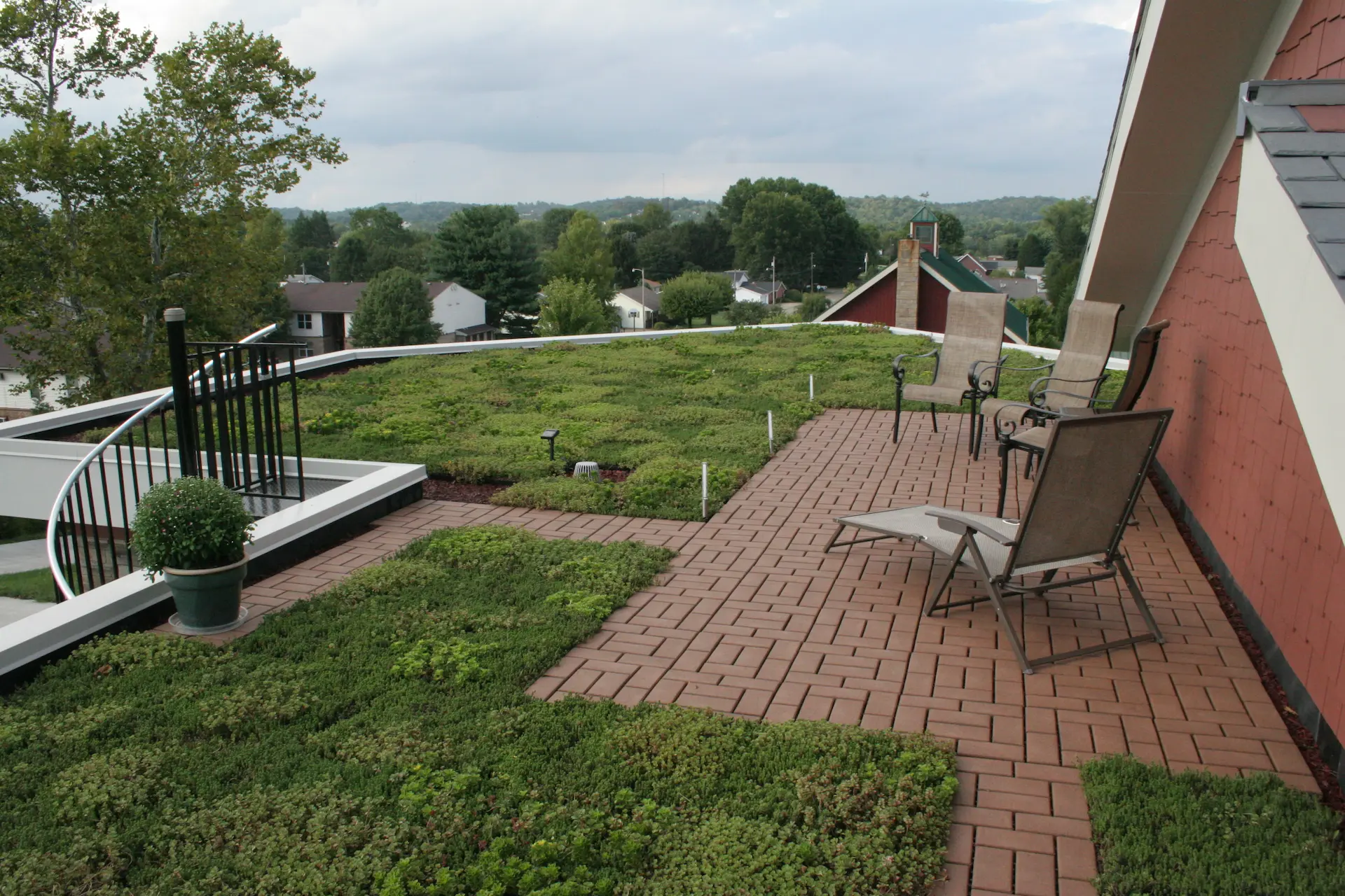 Upstairs balcony that is also a green roof