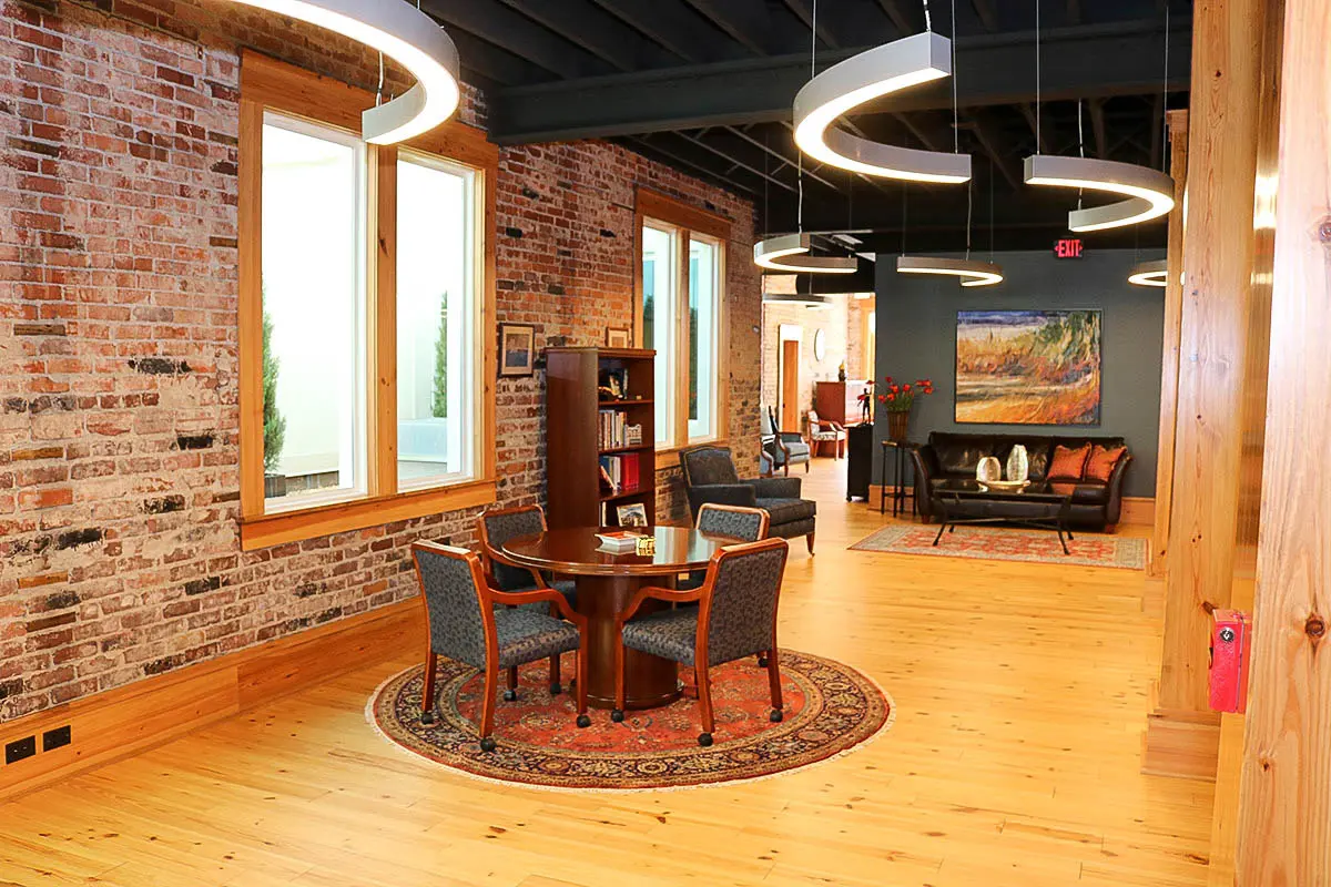 Exposed brick walls and ceiling.