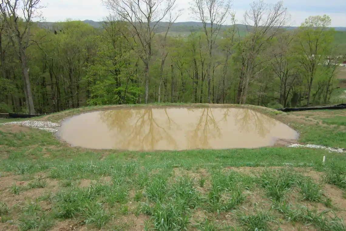 Retention pond for runoff during construction.